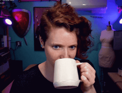 Woman Drinking From Mug With Submitted Watermark GIF
