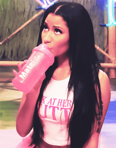 Woman Drinking From Pink Bottle Saying Matefit GIF