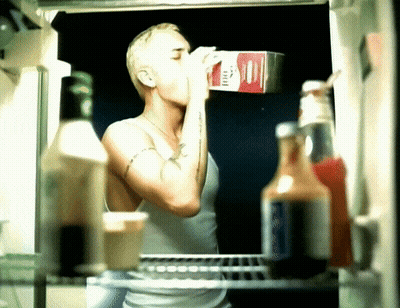 Woman Drinking Milk From Carton GIF
