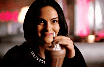 Woman Drinking Milkshake With Whipped Cream Smiling GIF