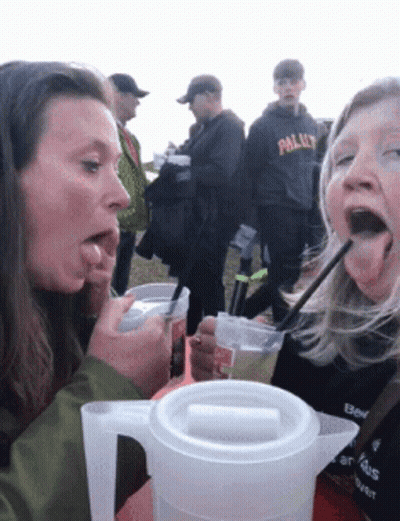 Woman Drinking Pitcher Straw Another Watching GIF
