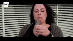 Woman Drinking Prosecco Straight From Bottle GIF