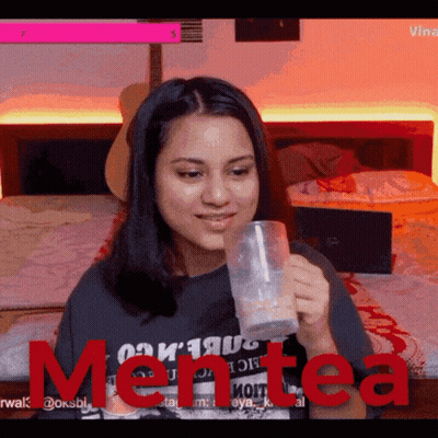 Woman Drinking Tea Saying Men Tea In Red GIF