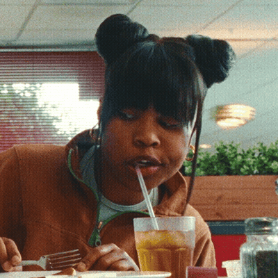Woman Drinking Through Straw From Glass GIF