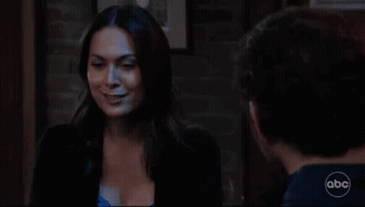 Woman Drinking Through Straw Next To Man GIF