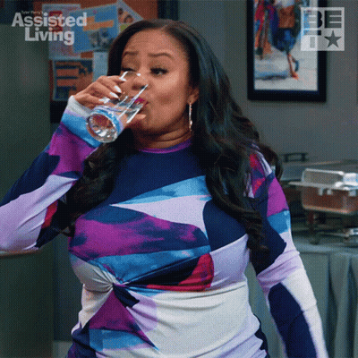 Woman Drinking Water In Front Of Assisted Living Poster GIF