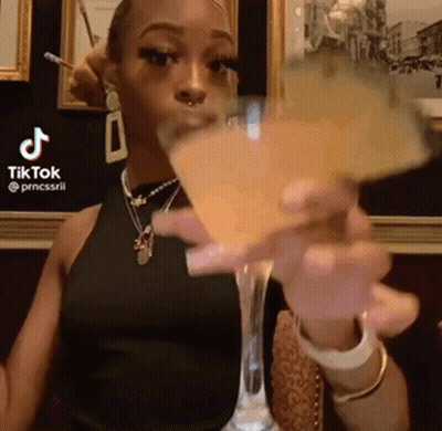 Woman Drinking Wine At Table GIF