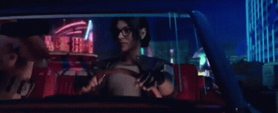 Woman Driving Car At Night Holding Gun GIF