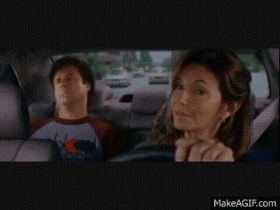 Woman Driving Car Next To Champion Shirt Man GIF