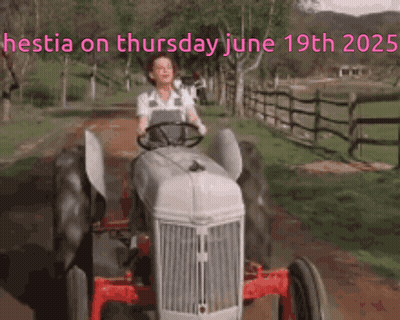 Woman Driving Tractor On Dirt Road June 19Th 2025 GIF