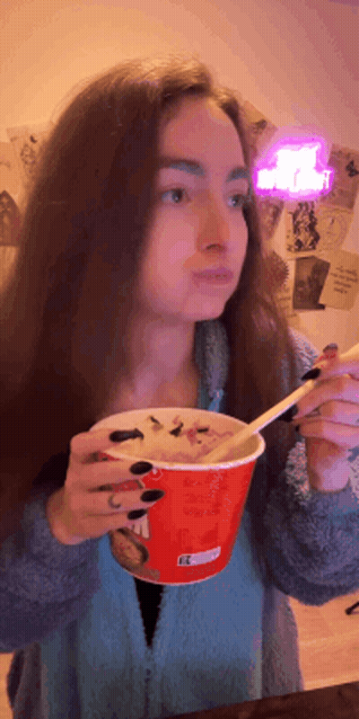 Woman Eating Bowl Of Food With Spoon GIF