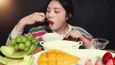 Woman Eating Bowl Of Fruit GIF