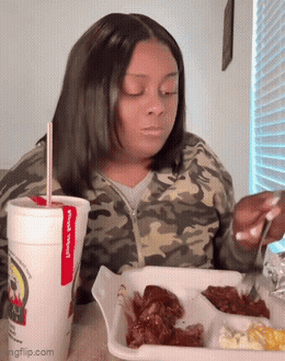 Woman Eating Chicken Wings Drinking Soda GIF