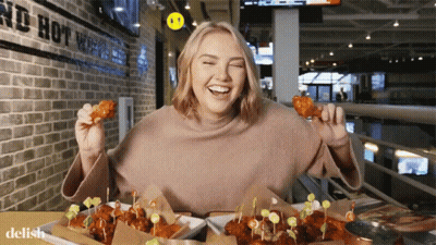 Woman Eating Chicken Wings GIF