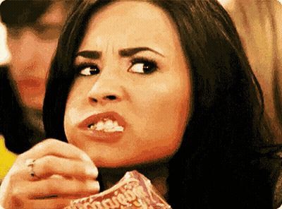 Woman Eating Crunchy Popcorn GIF