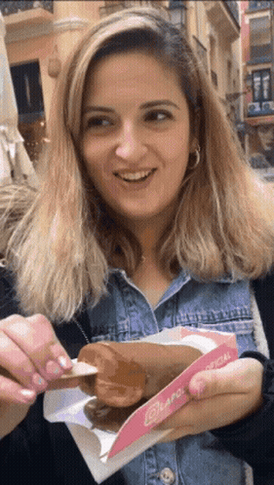 Woman Eating Donut From Lapol Oficial Box GIF