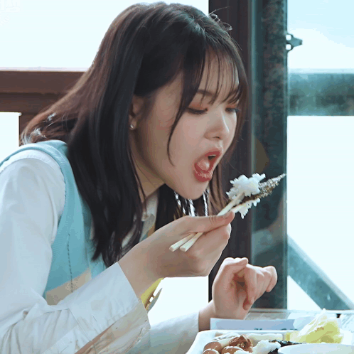 Woman Eating Food With Chopsticks Mouth Open GIF