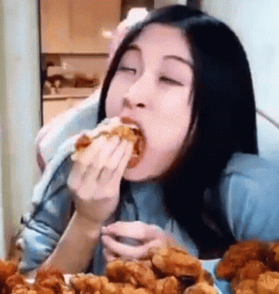 Woman Eating Fried Chicken GIF