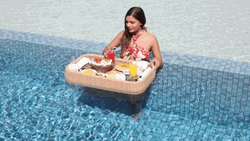 Woman Eating In The Pool GIF