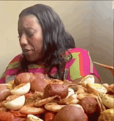 Woman Eating Large Pile Of Food GIF