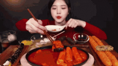 Woman Eating Meal With Chopsticks GIF