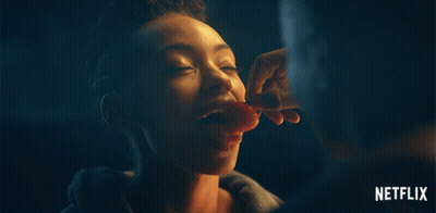 Woman Eating Meat With Netflix Logo