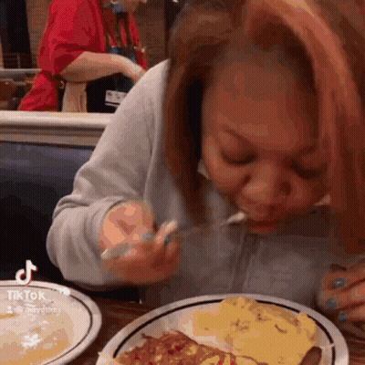 Woman Eating Pizza Slice With Fork GIF