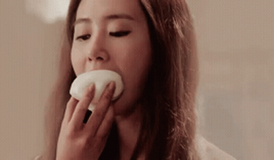 Woman Eating Soap Bar GIF