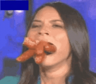 Woman Eating Two Sausages GIF