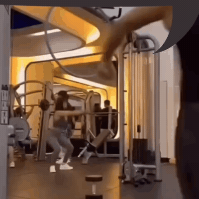 Woman Exercising In Gym GIF