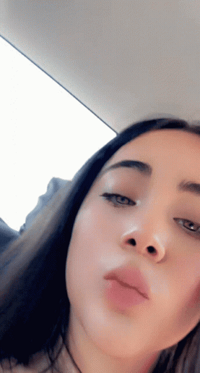 Woman Eyes Closed In Car GIF