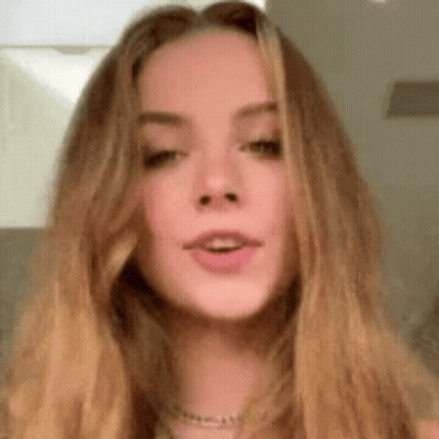 Woman Eyes Closed Mouth Open GIF