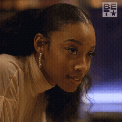 Woman Face Close Up In Front Of BET Logo GIF
