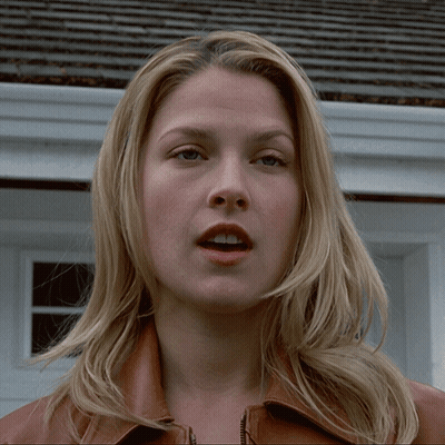 Woman Face Close Up In Front Of House GIF