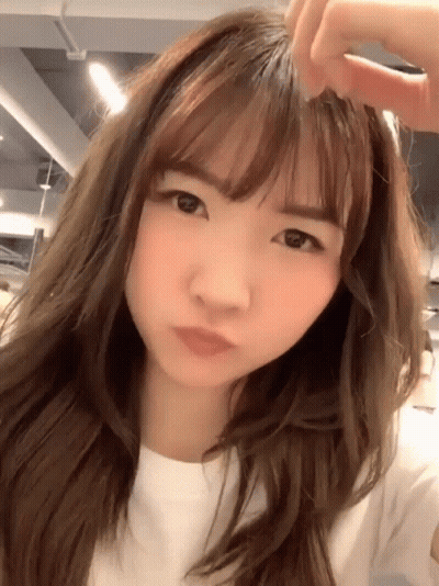 Woman Face Close Up Long Hair Bangs GIF