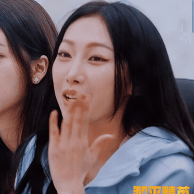 Woman Face Close Up With Chinese Writing GIF