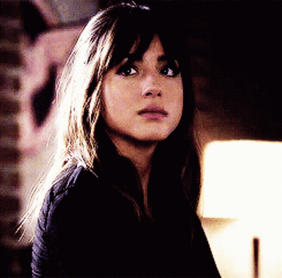 Woman Face Close Up With Lamp GIF