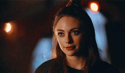 Woman Face Close Up With Lights GIF