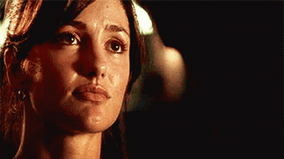 Woman Face Close Up With Man Behind GIF