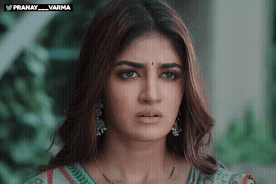 Woman Face Close Up With Pranay Varma Text GIF