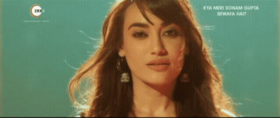 Woman Face Close-Up With Zee Logo GIF