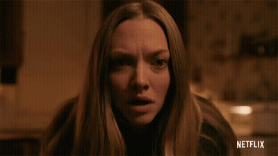 Woman Face In Dark Room With Netflix Logo GIF