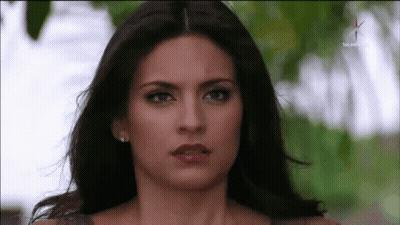 Woman Face On TV Saying La Nueva GIF