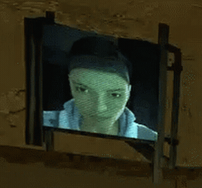 Woman Face Projected On Screen GIF