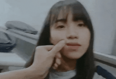 Woman Face Touched By Hand GIF