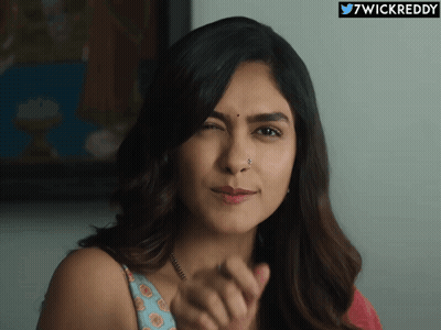 Woman Face With 7Wickreddy GIF