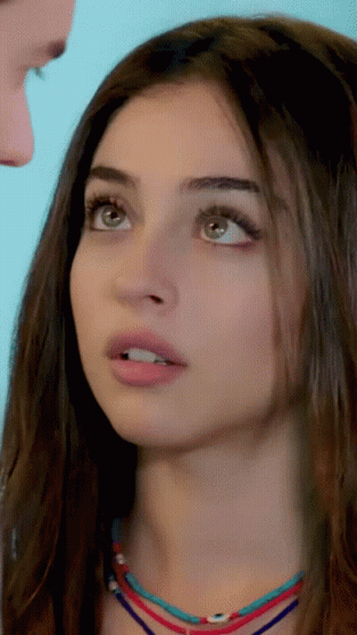 Woman Face With Man Behind GIF