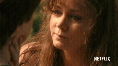 Woman Face With Netflix Logo GIF