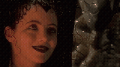 Woman Face With Person Reflection In Background GIF