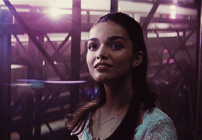 Woman Face With Purple Light Behind GIF